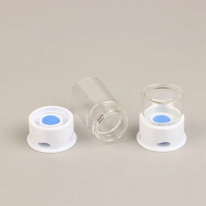 Close-up of glass ant water bowl base showing slow-release opening and moisture gradient