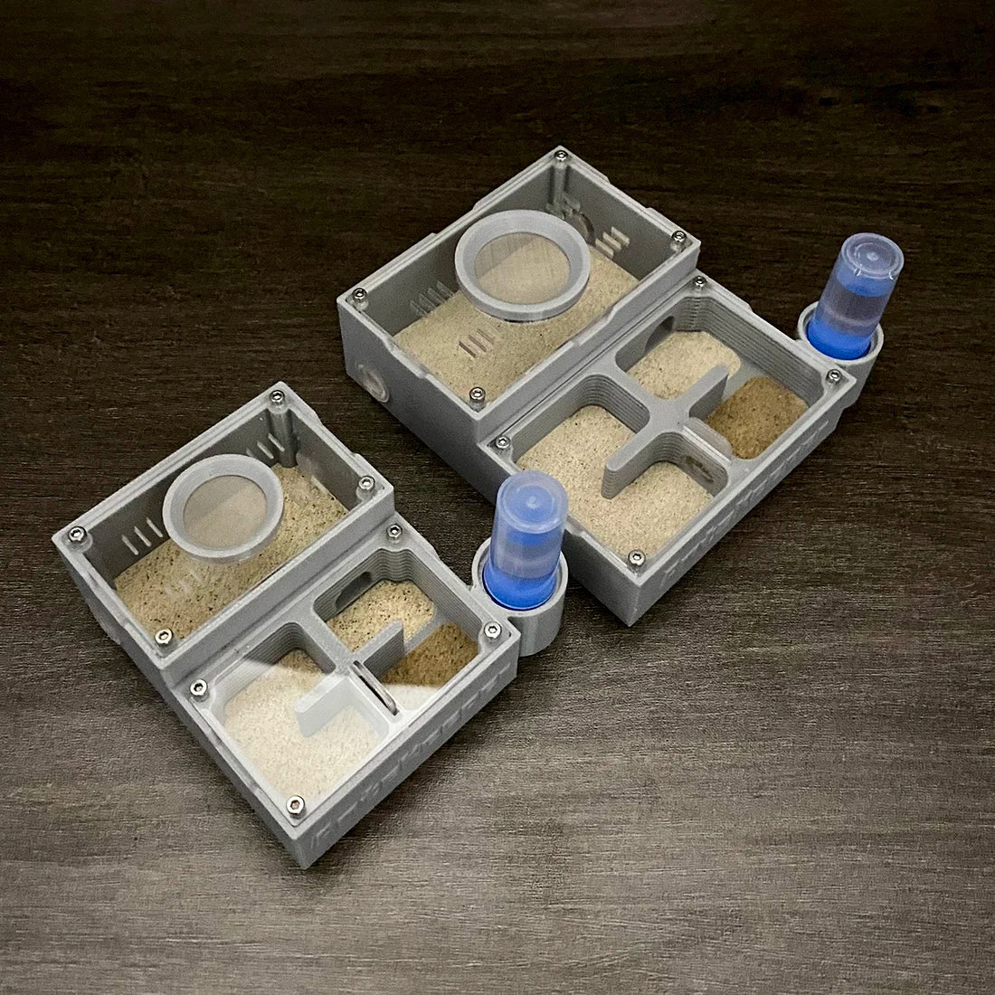 Hard sand substrate packed inside the AntsKeeper ant farm nesting chambers
