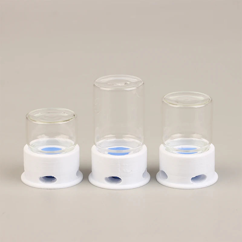 Ant farm water feeder glass tower in use inside acrylic formicarium outworld setup